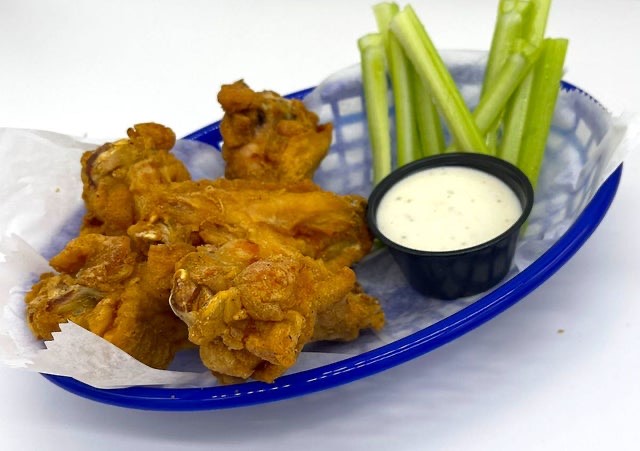 Wings with Buffalo Sauce with Celery at BITES Food Court + Bar, Langley Park